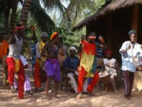 Drummers and dancers on the beach at Abene in the Casamance region of Senegal, January 2006