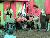 Performing at The Big Green Gathering, Somerset, August 2003