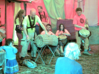 Performing at The Big Green Gathering, Somerset, August 2003
